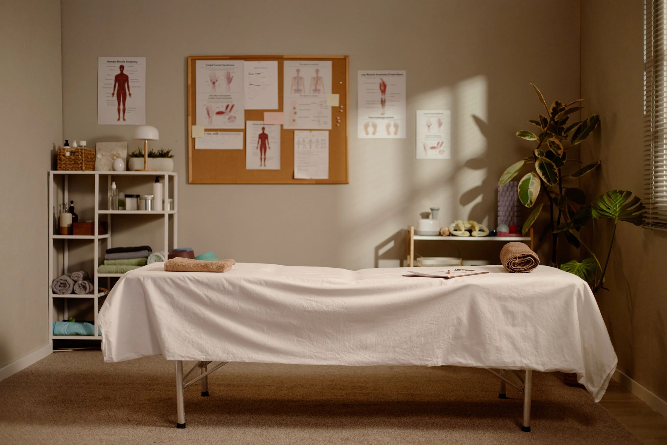 Massage therapy room preparing for wellness treatment session